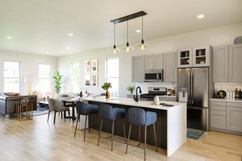 Kitchen with eat-in island at anthem luxury rentals and apartments in huntsville, al